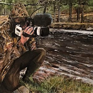 Andy Richardson filming on the river