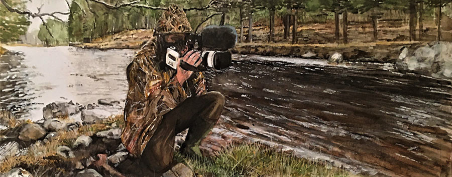 Andy Richardson filming on the river