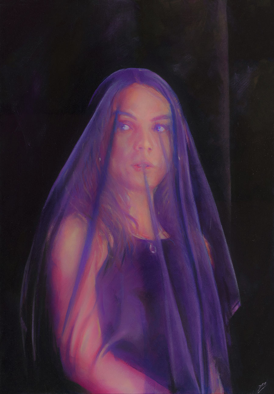 Young woman under a purple veil